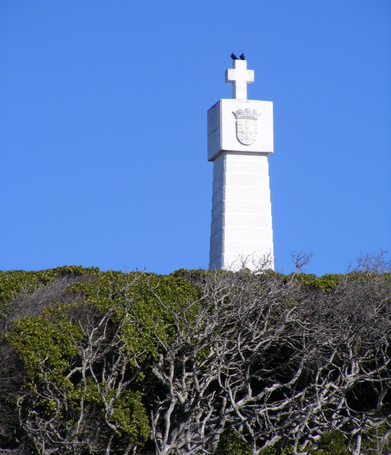 Da Gama Monument erected by the Portuguese government to commemorate his voyage and to double up as a navigation beacon; when lined up with the Dias Cross, they point to Whittle Rock in False Bay, a shipping hazard.